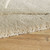 beige wool rug closeup edge