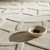 taupe wool rug closeup with a bowl