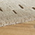 taupe wool rug closeup edge