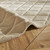 ivory wool rug closeup fold