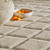 ivory wool rug closeup with bowl of fruit