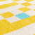 yellow chess eco rug closeup detail