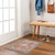 rust traditional rug in a room with matching decor