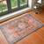 rust traditional rug in a room with matching decor