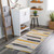multicolour abstract rug in a room with matching decor