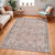 brown traditional rug in a room with matching decor