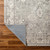 brown traditional rug corner folded on wood floor