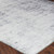 grey abstract rug closeup corner on wood floor