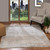 grey abstract rug in a room with matching decor