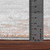 grey abstract rug pile height on wood floor