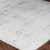 grey abstract rug closeup corner on wood floor