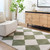 green diamond shaggy rug in a room with matching decor