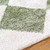 green diamond shaggy rug closeup detail