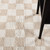 beige checker shaggy rug closeup detail