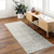 ivory black scandi rug in a room with matching decor