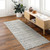 ivory black scandi rug in a room with matching decor