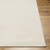 ivory off-white scandi rug closeup corner on wood floor