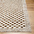 ivory black scandi rug closeup corner on wood floor