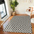 ivory black scandi rug in a room with matching decor