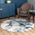 blue abstract rug in a room with matching decor