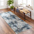 blue abstract rug in a room with matching decor