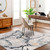 blue abstract rug in a room with matching decor