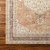 cinnamon traditional rug closeup corner on wood floor