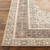 cinnamon traditional rug closeup corner on wood floor