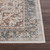 cinnamon traditional rug closeup corner on wood floor