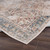 cinnamon traditional rug folded on wood floor