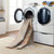 orange traditional rug in a washing machine