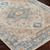 beige traditional rug closeup corner on wood floor