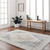 navy traditional rug in a room with matching decor