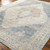 navy traditional rug closeup corner on wood floor
