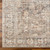 taupe traditional rug closeup corner on wood floor