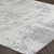 grey abstract rug closeup corner on wood floor