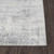 grey abstract rug closeup corner on wood floor