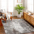 grey abstract rug in a room with matching decor