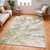 green abstract rug in a room with matching decor