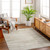 green abstract rug in a room with matching decor