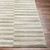 green abstract rug closeup corner on wood floor