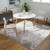 silver abstract rug in a room with matching decor