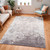 silver abstract rug in a room with matching decor