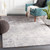 silver abstract rug in a room with matching decor