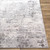 silver abstract rug closeup corner on wood floor