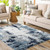 navy abstract rug in a room with matching decor