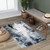 navy abstract rug in a room with matching decor