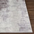 cream abstract rug closeup corner on wood floor
