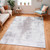 cream abstract rug in a room with matching decor
