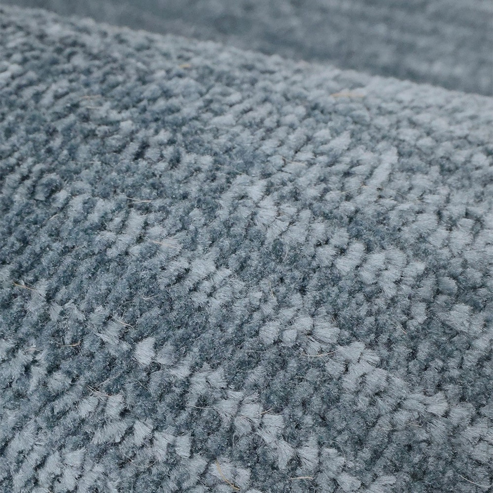 Closeup of Arlo Textured Blue Rug to show the texture and details.